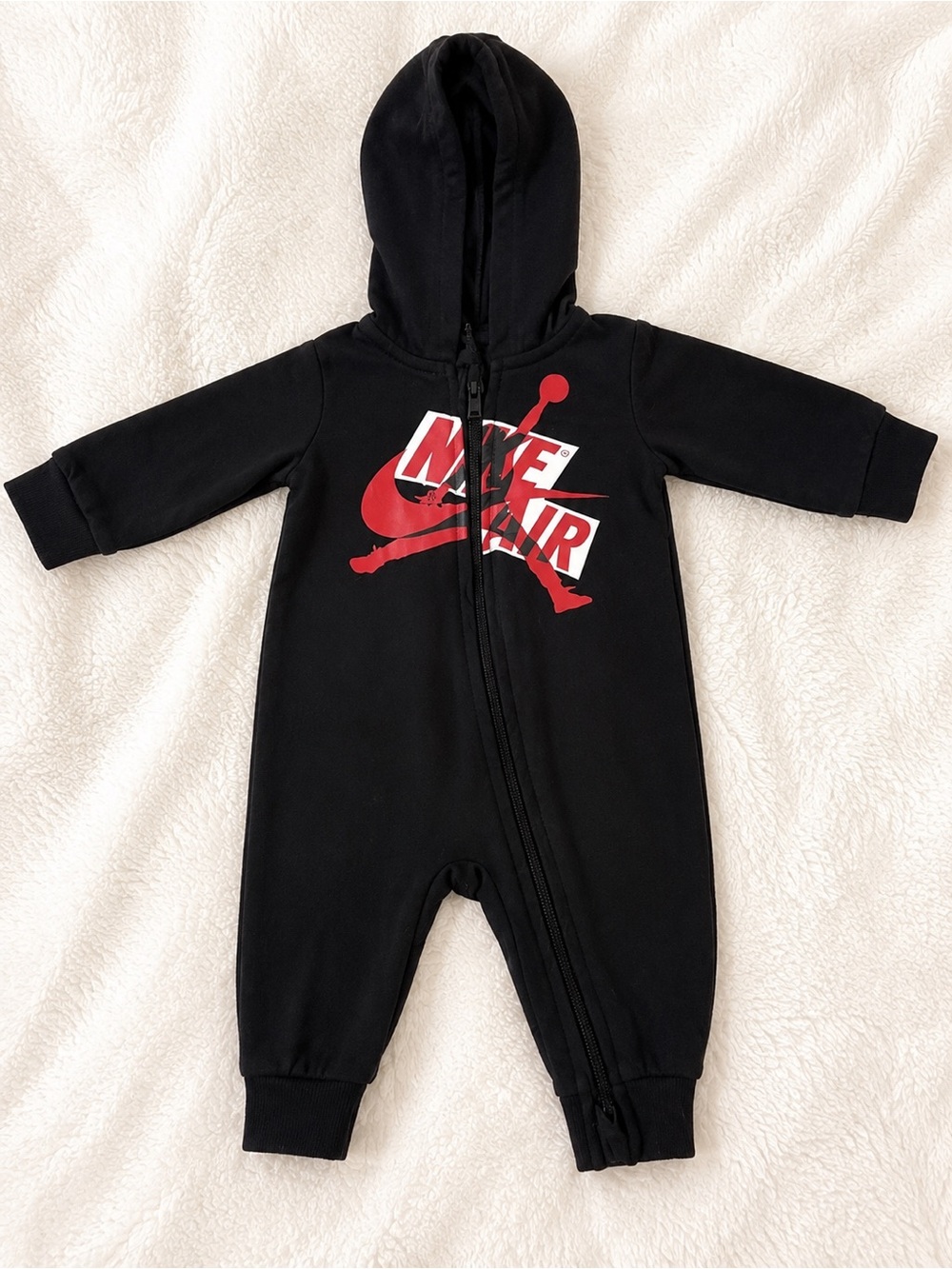 Jordan Black One-Piece Bodysuit with Red Logo